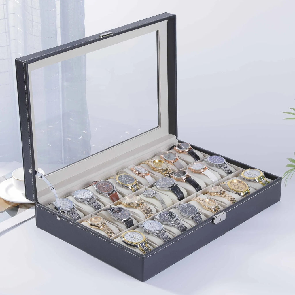 Grey leather watch storage box with see-through lid showing organised watch storage compartments