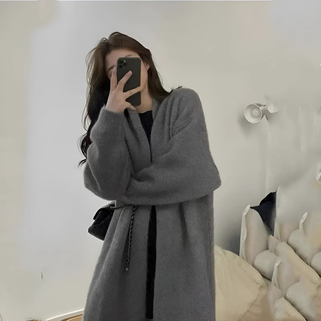 Women's loose chenille knitted cardigan with 3D pattern in dark grey colour showing 65cm length