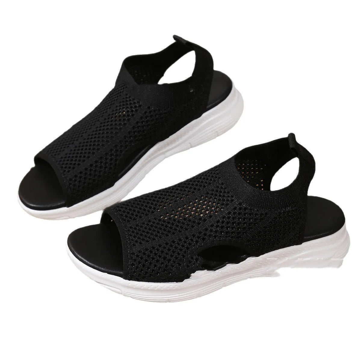 Women's platform sports sandals in black with a flat rubber sole and mesh lining.