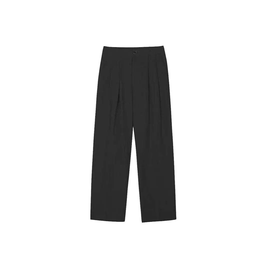 Men's light-weight wide-leg cotton linen trousers in apricot colour, showing loose fit and zip placket.