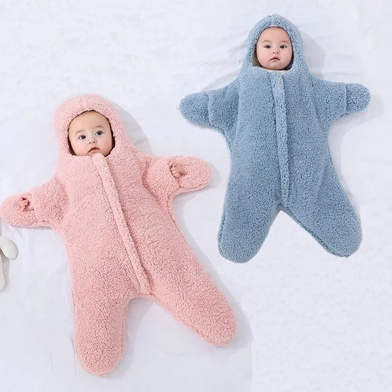 Baby lamb velvet starfish sleeping bag in khaki, hooded with zip and cuffs, lying flat on a surface