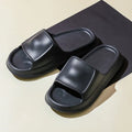 Unisex thick-soled EVA flip-flop slippers in multiple colours on a white background.