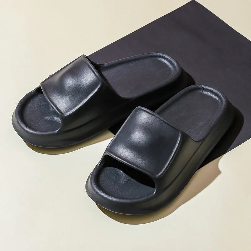 Unisex thick-soled EVA flip-flop slippers in multiple colours on a white background.