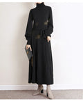 Turtleneck knitted dress with long sleeves, elastic waist, and loose hem in rose red, black, red, or blue colours