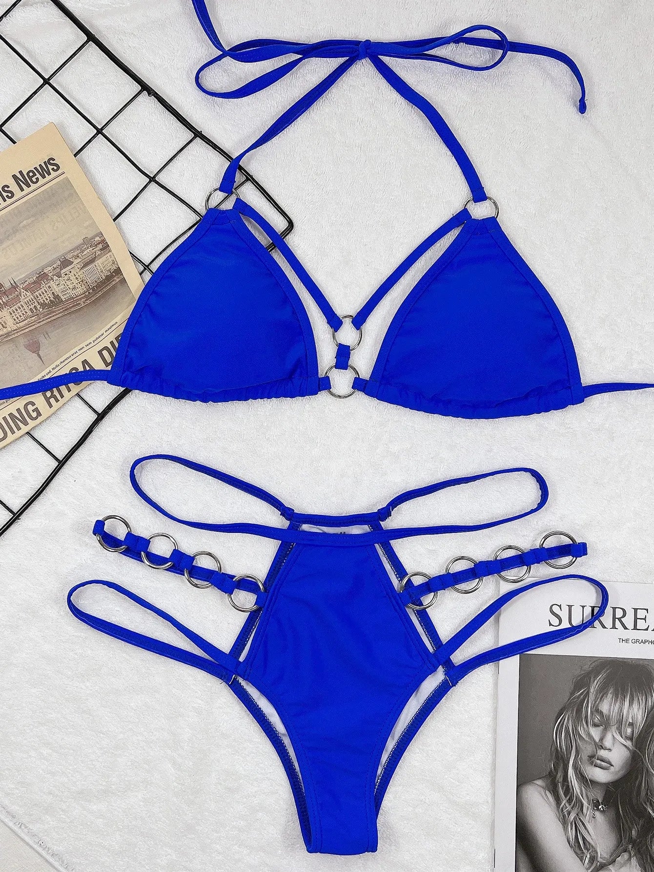 Women's separated nylon bikini set in red, including a bikini top and matching shorts.