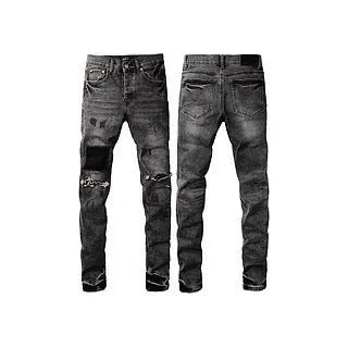 Men's black slim fit skinny jeans with a straight leg and button fly detail.