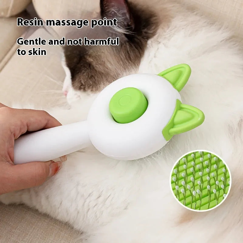 Self-cleaning cat grooming brush with stainless steel pins in greenish white and orange white colour options