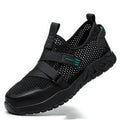 Men's grey safety shoes with steel toe caps, rubber soles, and flying woven upper construction