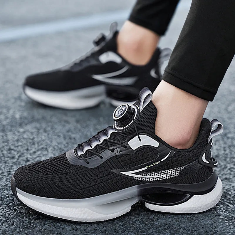 Men's white low-top running shoes with a rotating buckle closure and fly-knit mesh upper.