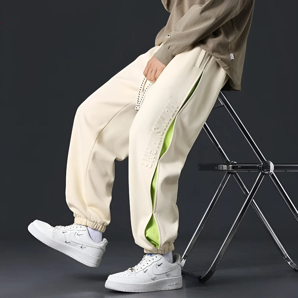 Men's cotton casual pants with ankle banded cuffs in loose fit design available in multiple colours