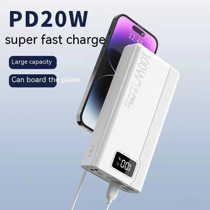 Black and white large capacity power bank with plastic shell showing fast charge support.