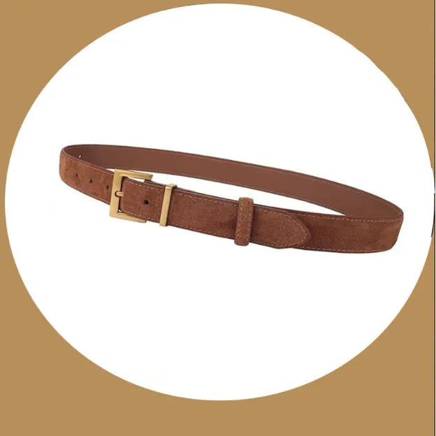 Ladies black leather belt with a silver quadrilateral pin buckle on a white background.