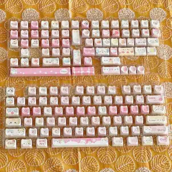 Full set of 141 Meow Meow Team themed keycaps with sublimation printing on five sides.