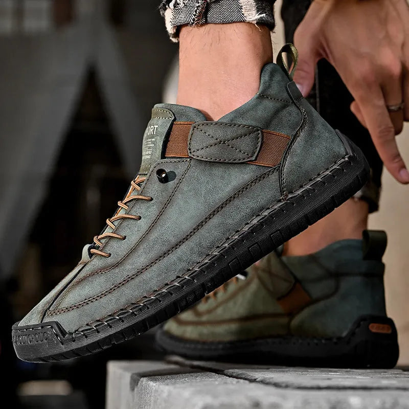 Men's mid-top Martin boots in multiple colours with elastic band and tooling stitching detail.