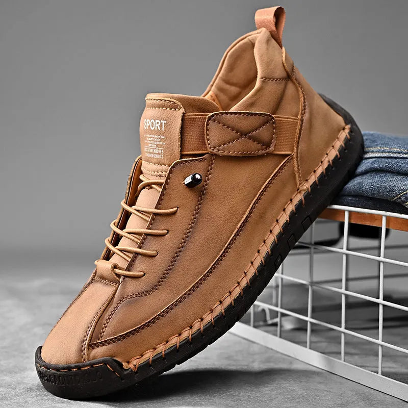 Men's mid-top Martin boots in multiple colours with elastic band and tooling stitching detail.