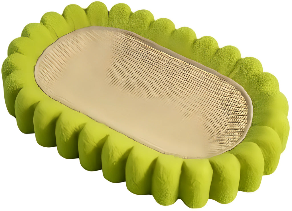 Green oval sisal cat scratch pad bowl serving as a cat bed and furniture protector.