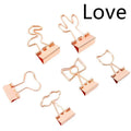 Gold metal office clip with long tail and decorative charm options including flamingo, love, clouds, cat, cactus and bow designs