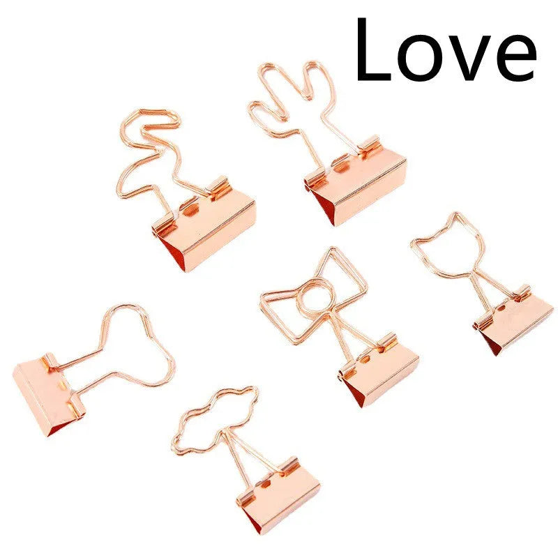 Gold metal office clip with long tail and decorative charm options including flamingo, love, clouds, cat, cactus and bow designs