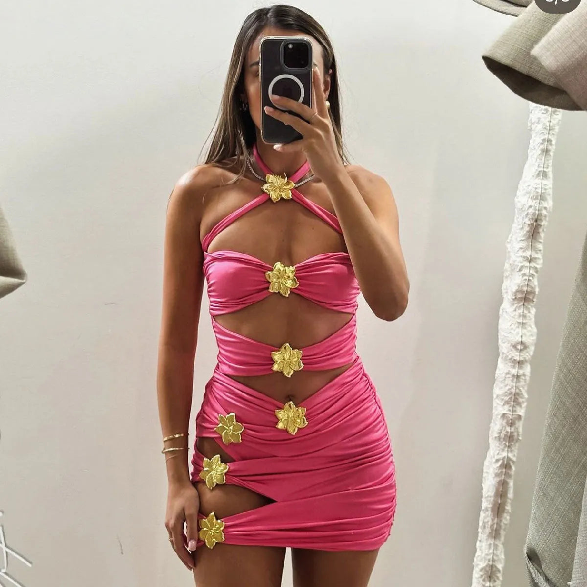 Women's solid colour one-piece swimsuit with high waist, hollow-out tube top, and a matching detachable short skirt.