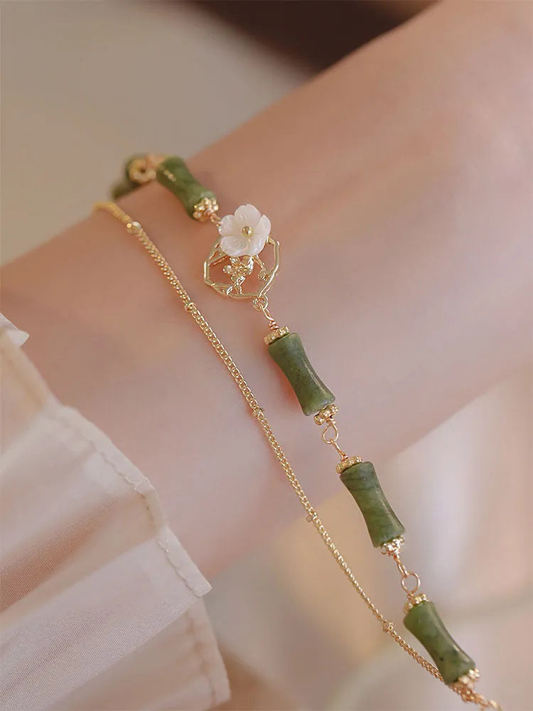 Green olivine double layer bracelet with Bells of Ireland charms and olive branch detailing for women