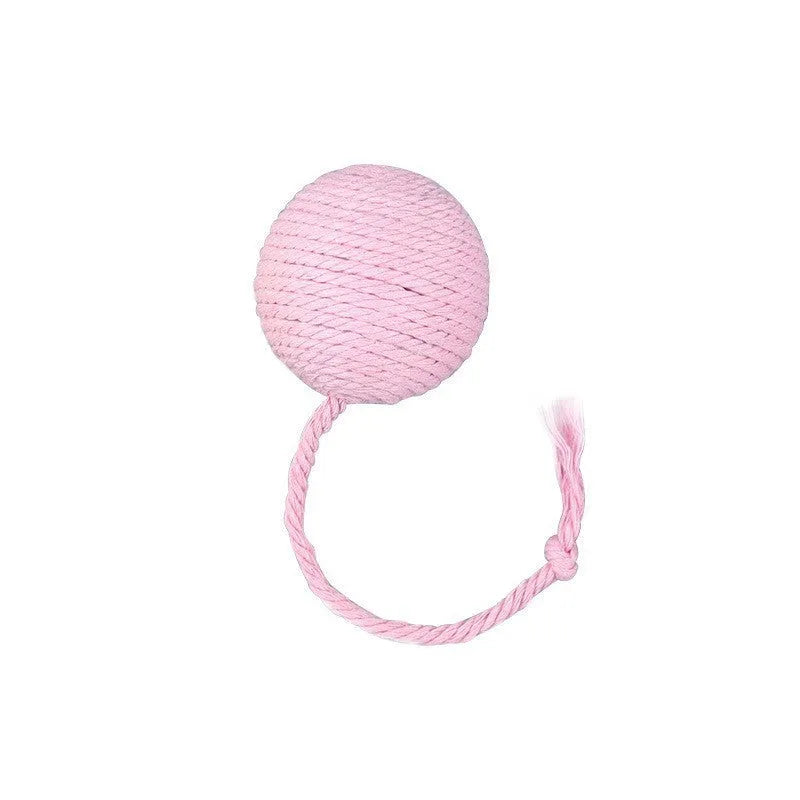 Cat toy ball with rope attached in green, pink, purple, or yellow colours with internal bell