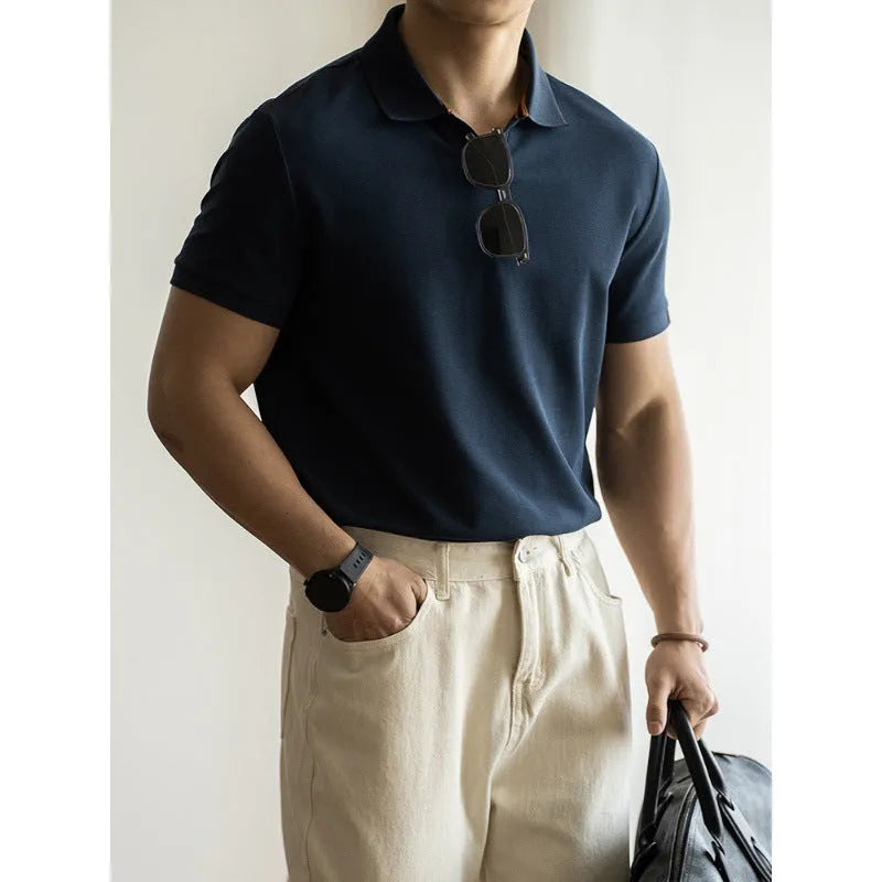 Man's blue short-sleeved cotton blend polo shirt with a collar, regular fit for summer.