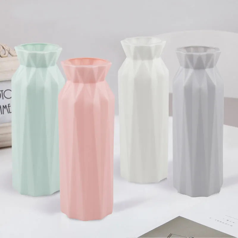 Green drop-resistant melamine plastic vase with 7.2cm base on a wooden desk.