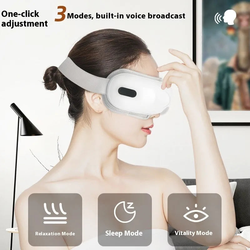 White rechargeable eye massager with airbag pressure and hot compress functions for eye fatigue relief