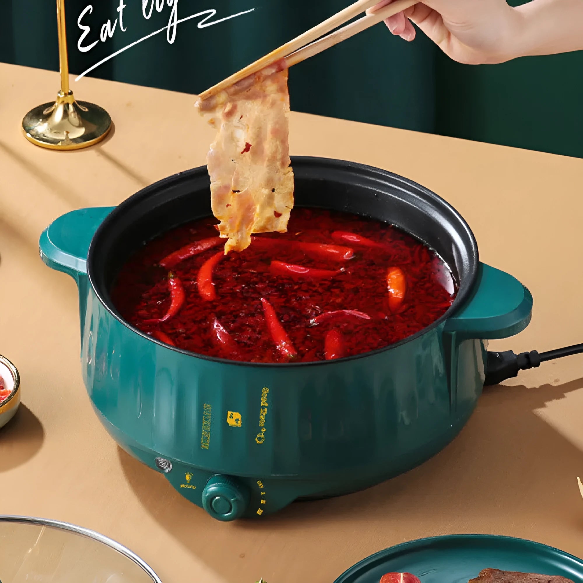 Electric hot pot with non-stick interior and stainless steel body in green or white colour options