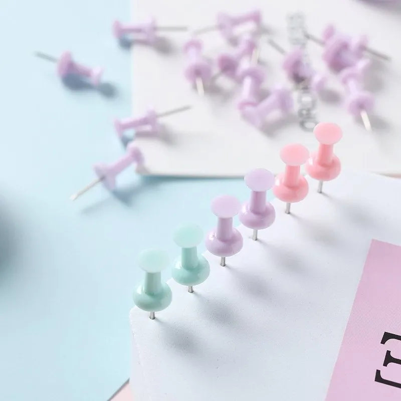 Macaron colour plastic push pins in cherry blossom pink, mint green, and lavender with large and small sizes