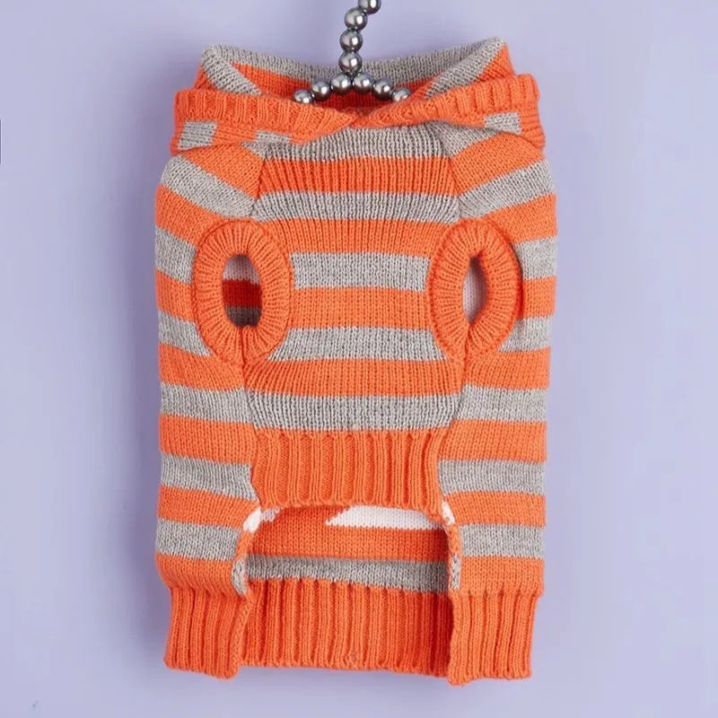 Orange Halloween pet sweater with contrast stripes, hood, and fur ball trim for dogs and cats
