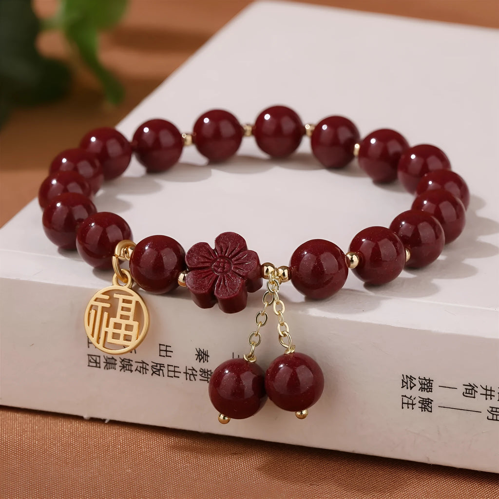 Retro women's cinnabar bracelet with Fu character charm in purple gold sand colour