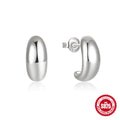 Sterling silver C-shaped stud earrings with electroplated gold finish, geometric design