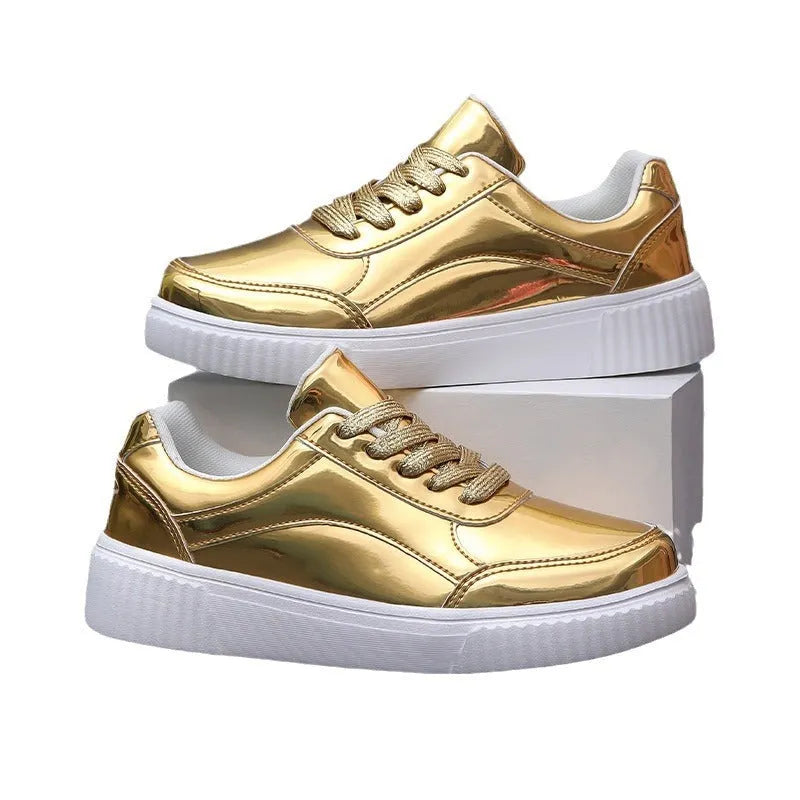 Rose gold sequinned platform sneakers with round toe and thick MD sole on a white background