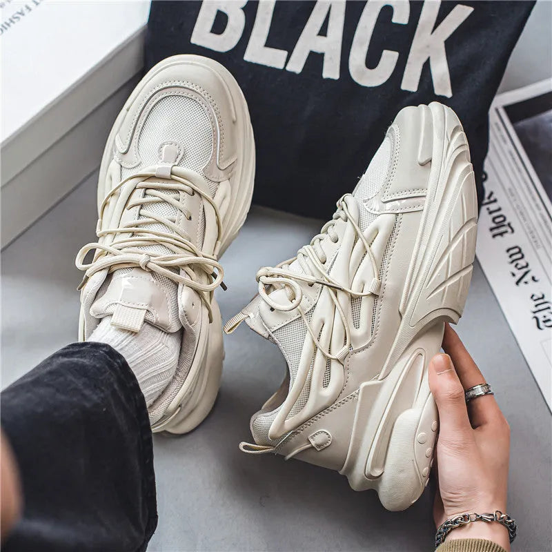 Men's beige sneakers with mesh upper and lace-up closure on rubber sole